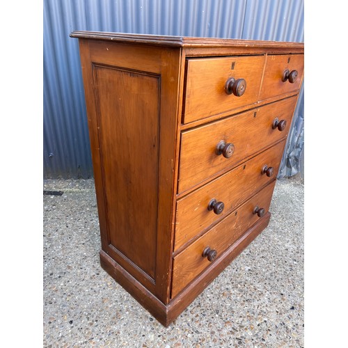 111 - A victorian pitch pine chest of five drawers