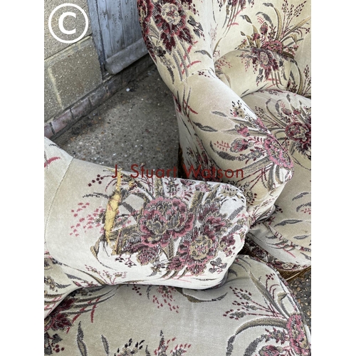 310 - A pair of early 20th century brown and floral pattern bedroom chairs