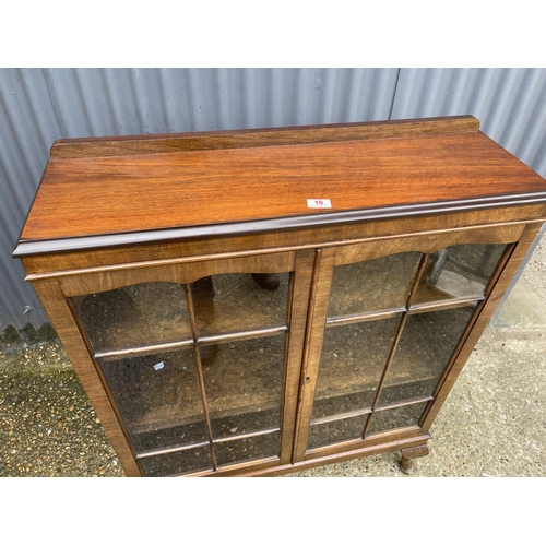 10 - A glazed mahogany two door bookcase