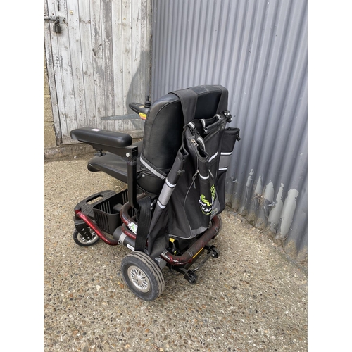 102 - A ROMA electric powered wheelchair in full working order with charger