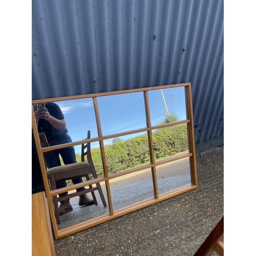 127 - A large teak framed lattice mirror