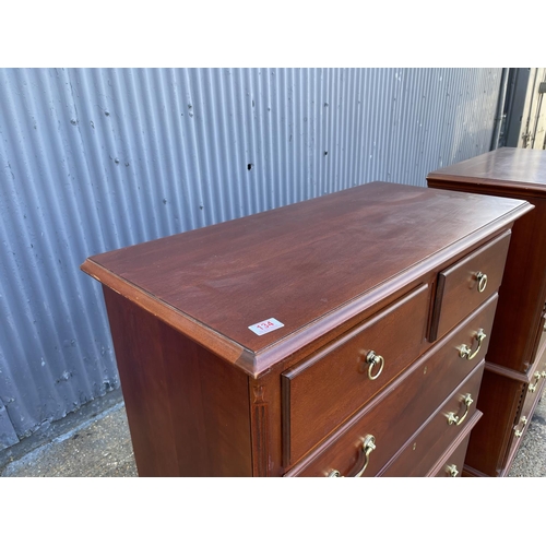 134 - A hardwood tallboy chest of drawers stamped MADE IN USA 95x40x146