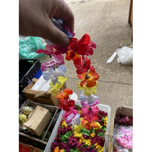 154 - Two large boxes of floral decorations / head dress