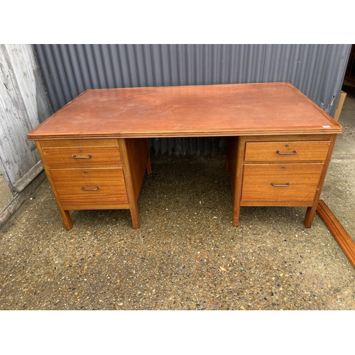 167 - A large twin pedestal oak office desk