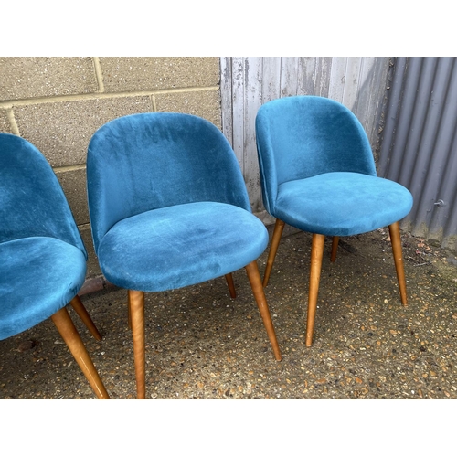 170 - A set of four modern blue upholstered chairs