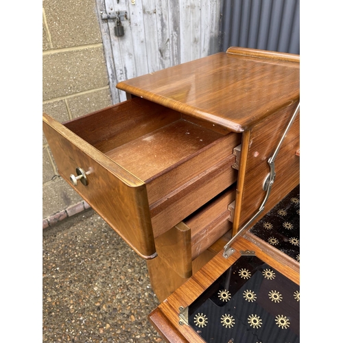 177 - A deco style walnut cocktail sideboard with mirror glass interior