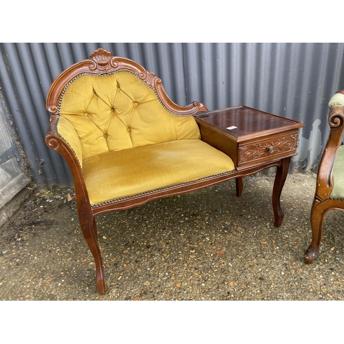 181 - A reproduction Italian style telephone table together with a green upholstered elbow chair