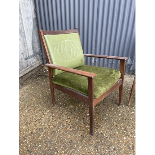 196 - A pair of teak framed green mid century Italian elbow chairs