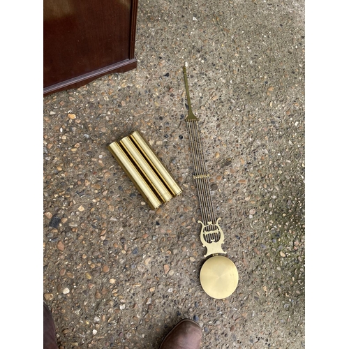 199 - A reproduction longcase clock with weights and pendulum