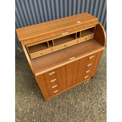 202 - A mid century danish style teak cylinder front bureau