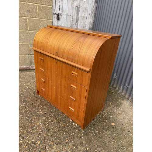 202 - A mid century danish style teak cylinder front bureau