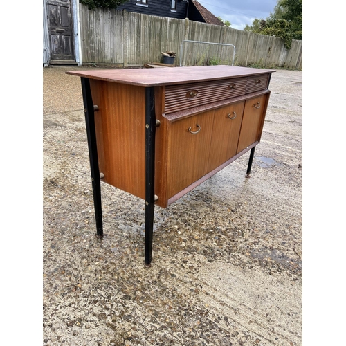 221 - A mid century teak sideboard possibly avalon