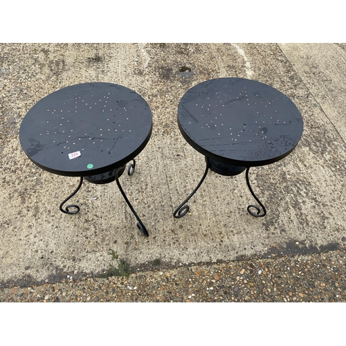 224 - A pair of circular metal work bistro tables