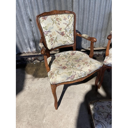 230 - A pair of frenchnstyle elbow chairs together with a matching stool