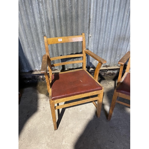 233 - A  pair of oak carvers / desk chairs