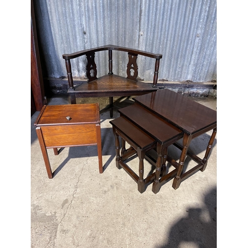 240 - An oak corner chair, oak nest of three and a sewing box