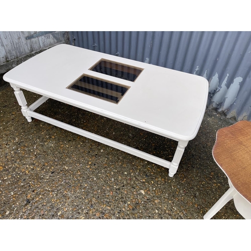 250 - A painted coffee table together with a painted swivel top sewing box