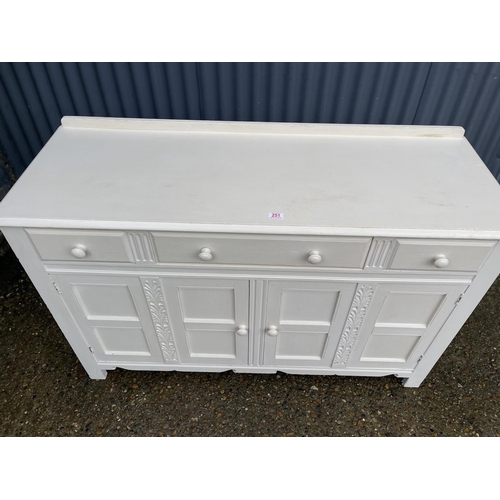 251 - A white painted oak three drawer sideboard