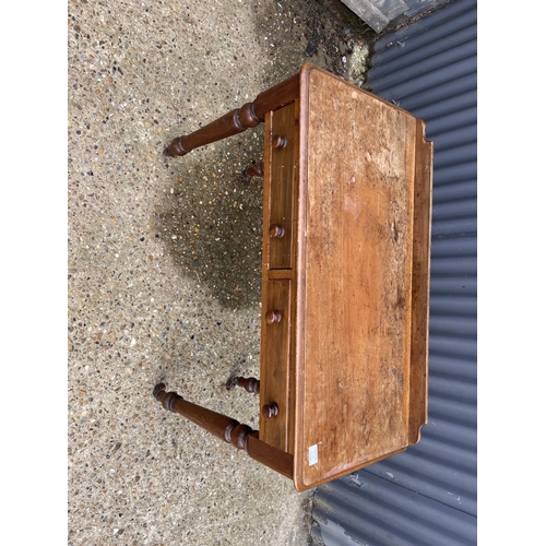 276 - A Victorian mahogany two drawer writing table