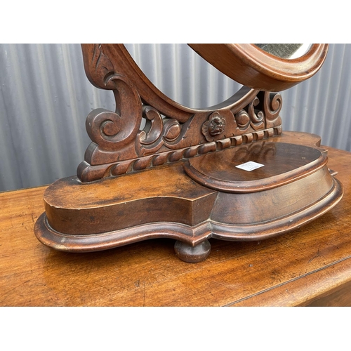 281 - A Victorian mahogany swing mirror