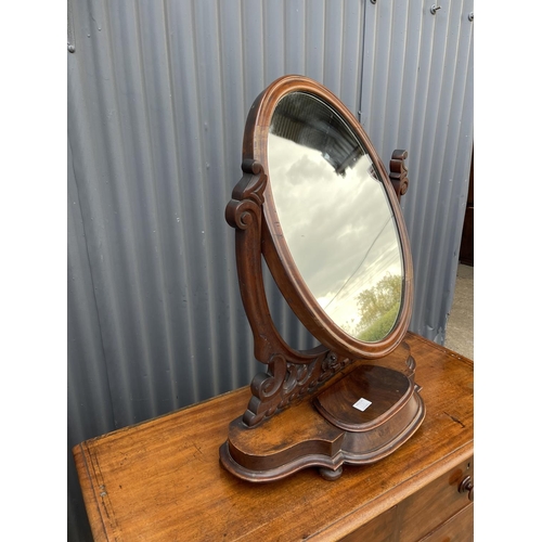 281 - A Victorian mahogany swing mirror