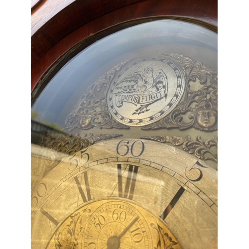 292 - An impressive oak cased longcase clock with tempus fugit movement 240cm tall