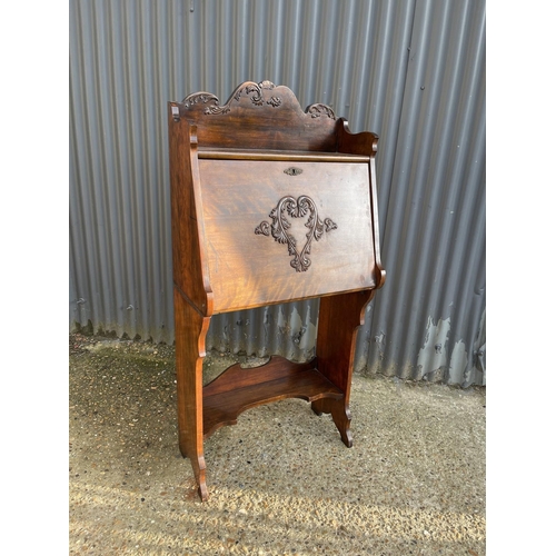 295 - A Victorian mahogany students bureau with heart shaped decoration to front