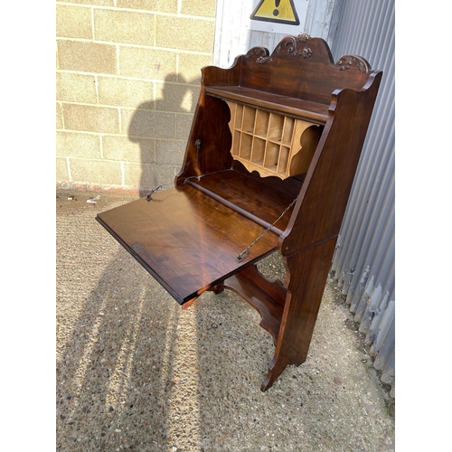 295 - A Victorian mahogany students bureau with heart shaped decoration to front