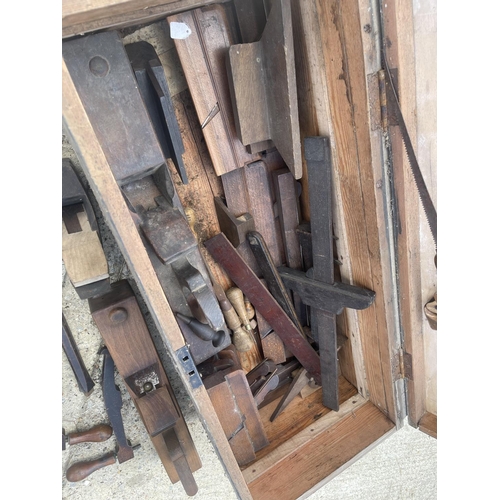 322 - A carpenters box full of wooden planes, marking gauges etc together with four cramps