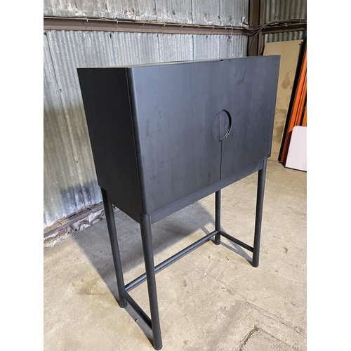 34 - A modern designer black ash cupboard/ sideboard