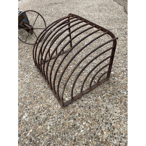 37 - A vintage iron hay rack