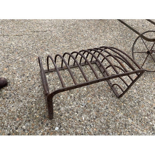 37 - A vintage iron hay rack