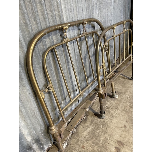 39 - A pair of vintage brass  bed ends