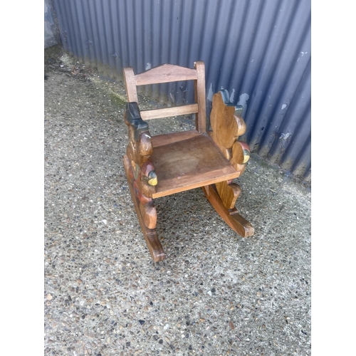 392 - A Winnie the Pooh child's rocker chair