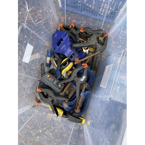 410 - A large quantity of assorted tools including tub of cramps, power tools, metal tool boxes etc