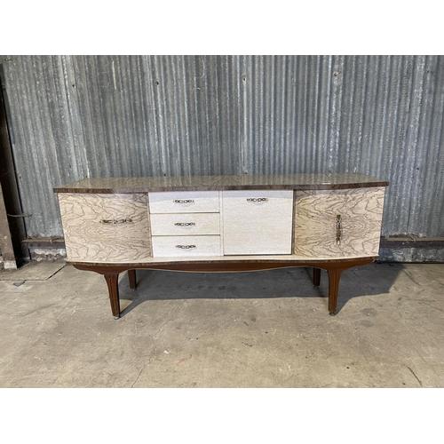 44 - A mid century formica cocktail sideboard