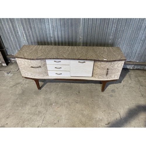 44 - A mid century formica cocktail sideboard