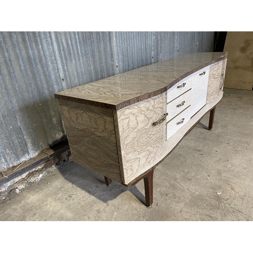 44 - A mid century formica cocktail sideboard