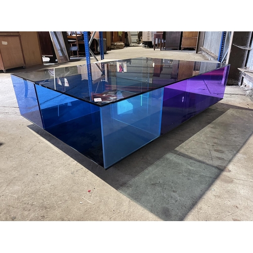 48 - A designer blue glass coffee table by NATUZZI 126x85x35