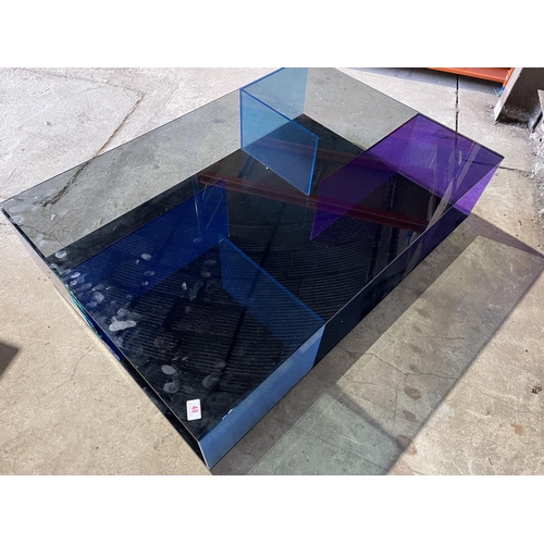 48 - A designer blue glass coffee table by NATUZZI 126x85x35