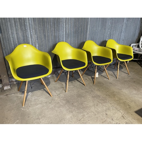 49 - A set of four EAMES design chairs produced by VITRA