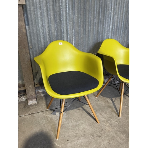 49 - A set of four EAMES design chairs produced by VITRA