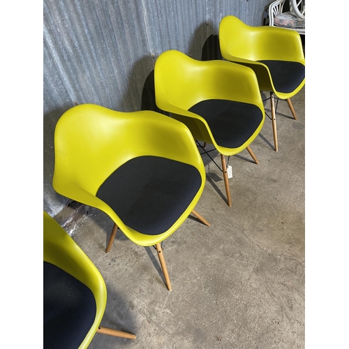 49 - A set of four EAMES design chairs produced by VITRA