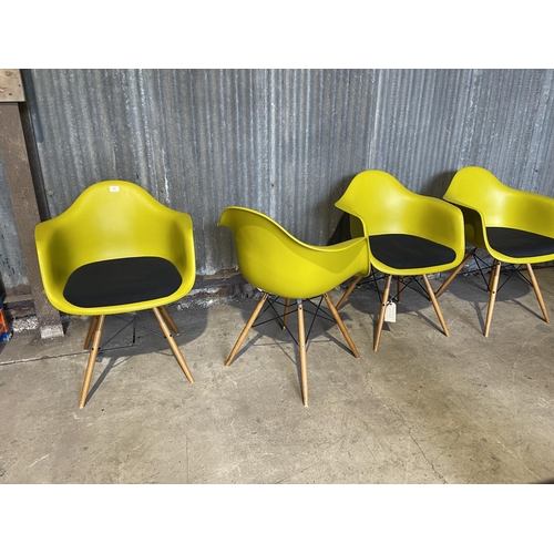 49 - A set of four EAMES design chairs produced by VITRA