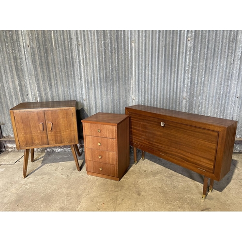 51 - A retro record cabinet, teak bedside chest and another teak cupboard