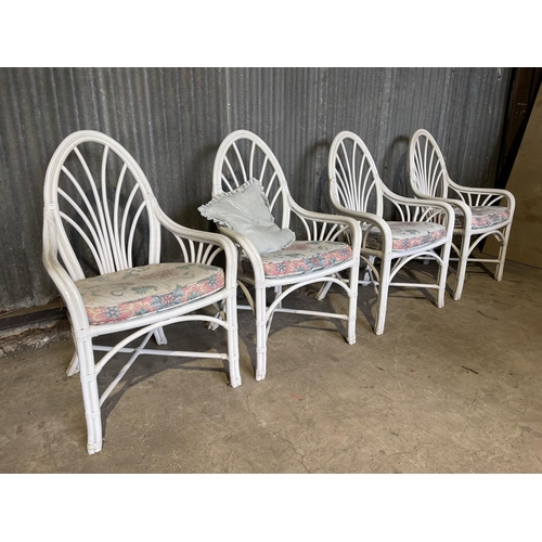 56 - A set of four mid century white painted bamboo chairs