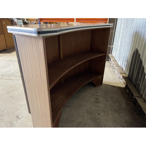 60 - A mid century cocktail bar unit with a formica top and teak and black vinyl to the front