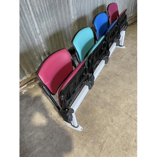 61 - A row of four fold up waiting room bench seating 200cm