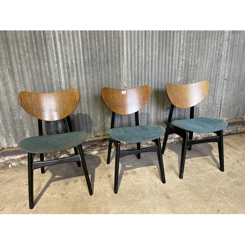 67 - A set of three g plan butterfly back chairs