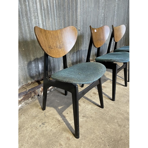 67 - A set of three g plan butterfly back chairs